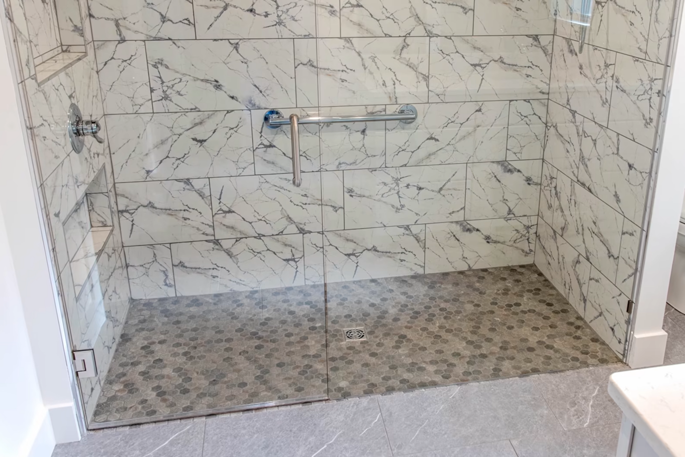 Zero-step shower renovation for homeowner aging in place.